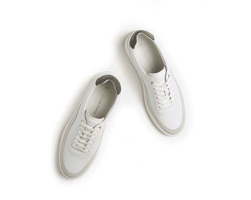Filling Pieces Mondo Squash Tag detalle — construcción cuero premium