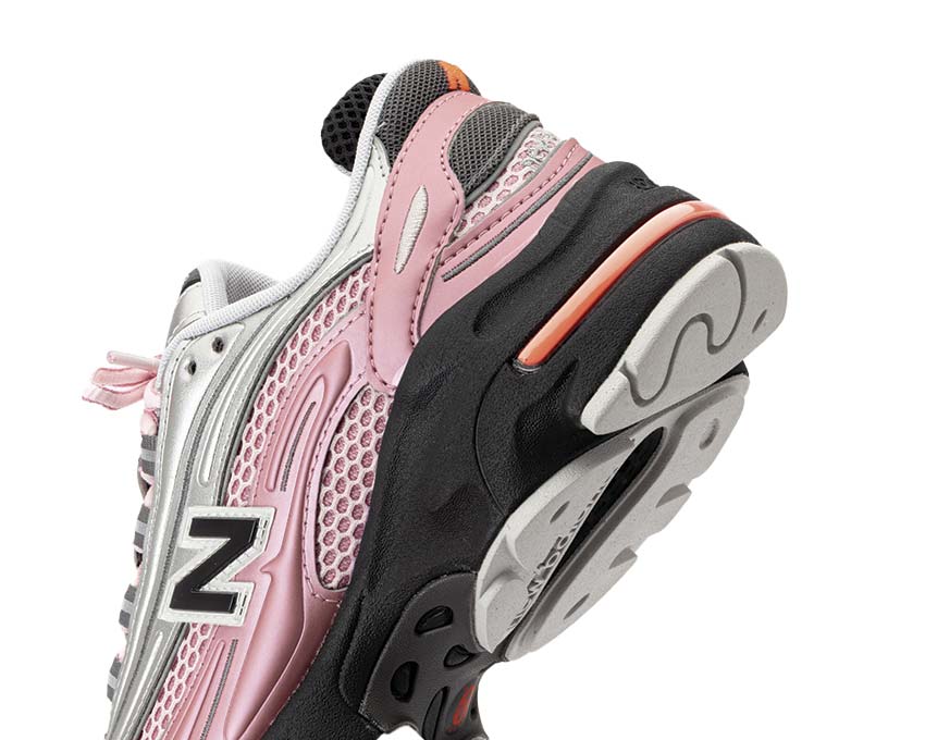 New Balance 1000 Pink Taffy side view — trail silhouette leather pink taffy