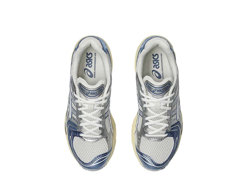 Asics Gel Kayano 14 Cream/Denim Blue rear view — Gel heel cushioning