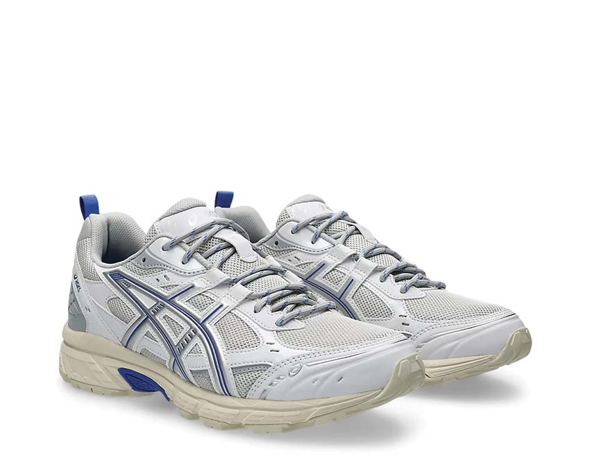 Asics Gel Nunobiki White/Sapphire vue latérale — superpositions synthétiques urban trail