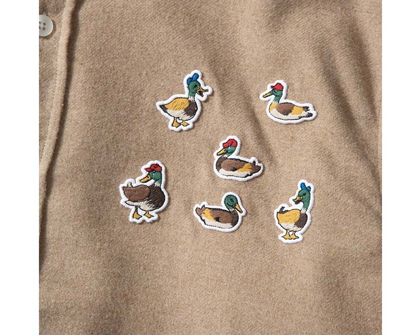 Edmmond Studios 10 Years Shirt Plain Brown detail — embroidered logo 10 years