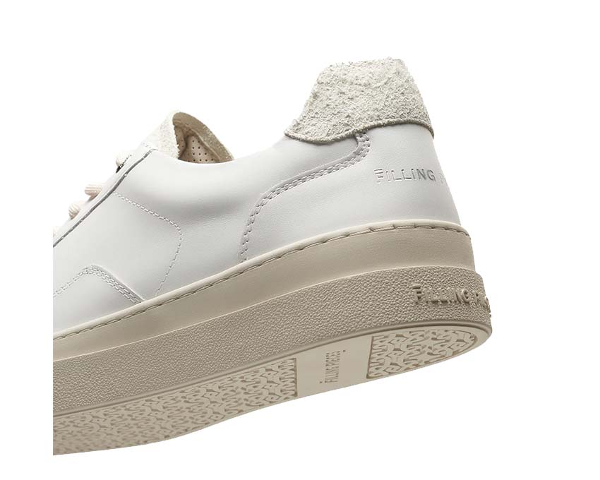 Filling Pieces Mondo Viera White detalle — acabados cuero lujo holandés