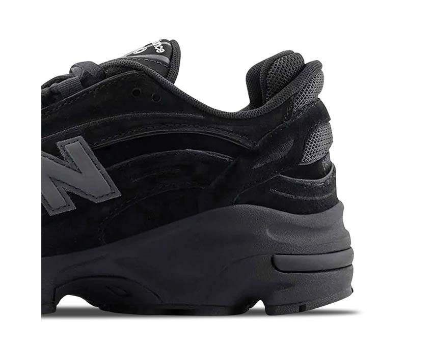 New Balance 1000 Black lateral view — robust trail-inspired silhouette