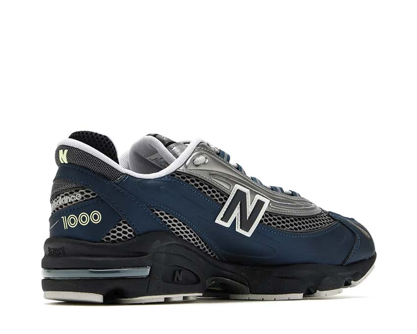 New Balance 1000 Deep Ocean vue latérale — tige cuir et mesh bleu ocean profond