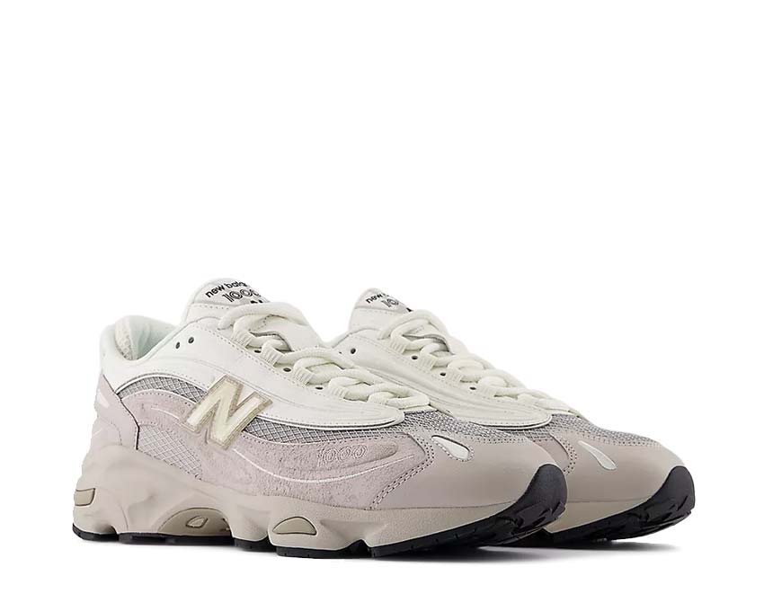 New Balance 1000 Moonrock vista lateral — parte superior ante y mesh
