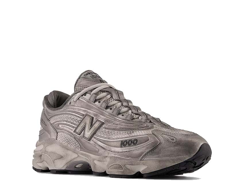 New Balance 1000 Silver Metallic vista lateral — refuerzos metálicos