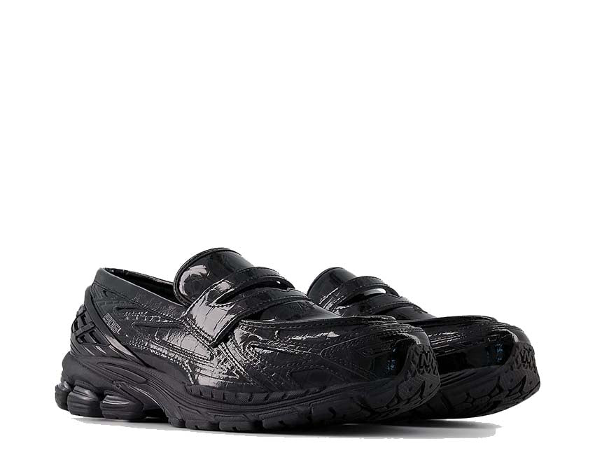 New Balance 1906L Black vue latérale — profil en cuir