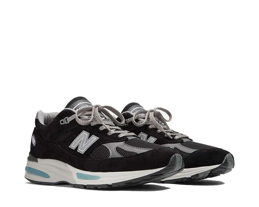 New Balance 991 Made in UK Black Smoked Pearl vue latérale — cuir et mesh premium