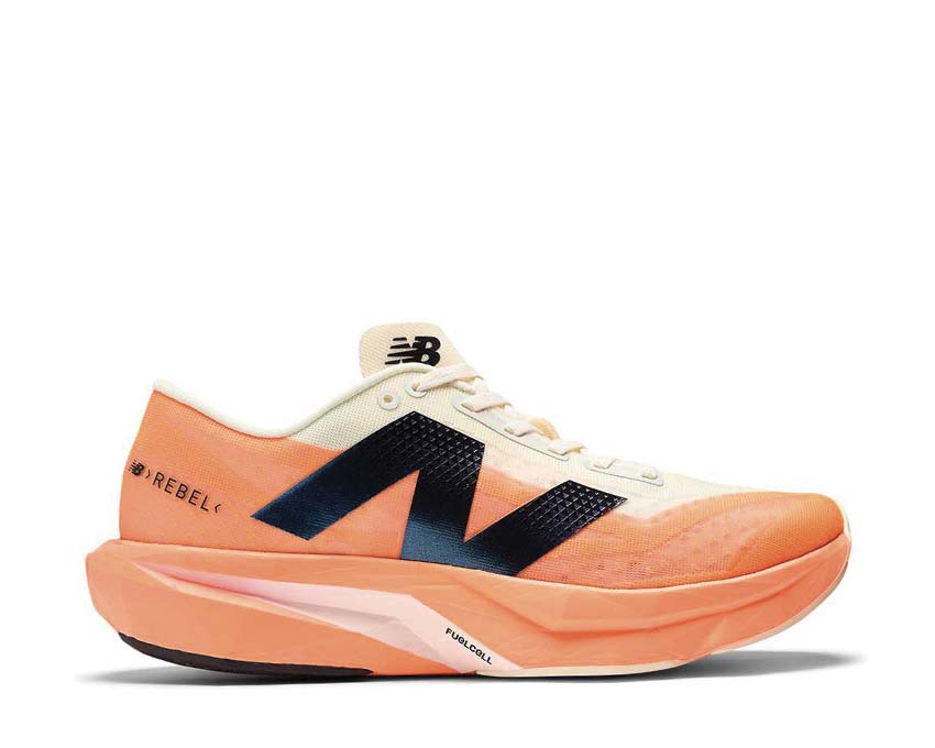 New Balance FuelCell Rebel V4 Mango — women's running shoe vibrant colorway
