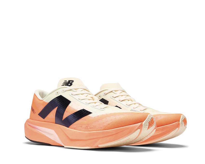 New Balance FuelCell Rebel V4 Mango lateral view — propulsive FuelCell foam