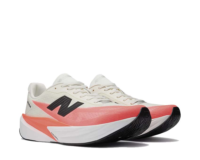 New Balance FuelCell Rebel v5 Urgent Red side view — bright red reactive mesh upper