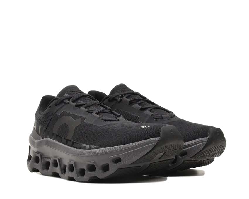 On Cloudmonster W Black/Magnet Seitenansicht — Dämpfungsprofil Damen-Laufschuh