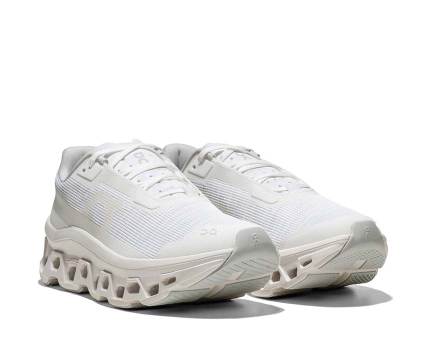On Cloudmonster Void White vista lateral — perfil Void running blanco