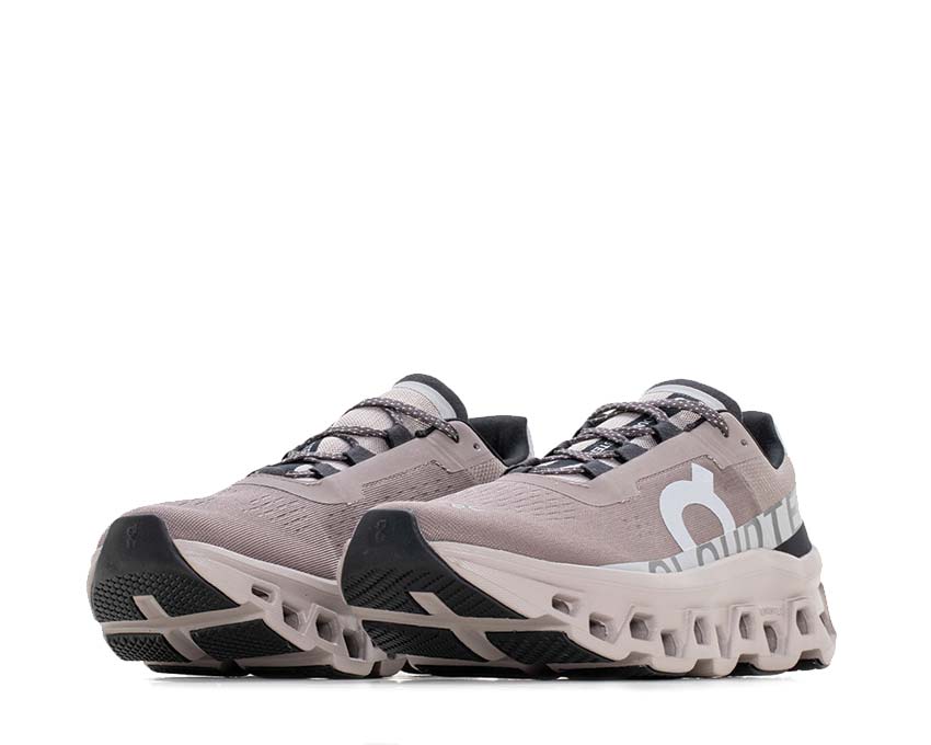On Cloudmonster W Cinder/Fog vista lateral — perfil amortiguación zapatilla running mujer