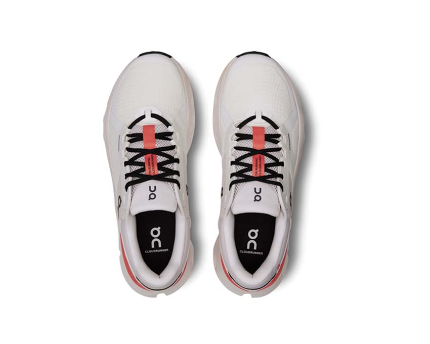 On Cloudrunner 2 White/Sand detalle — amortiguación CloudTec zapatilla running mujer