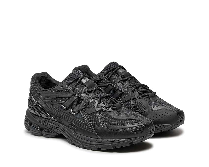 New Balance 1906N Noir vue latérale — tige mesh respirante