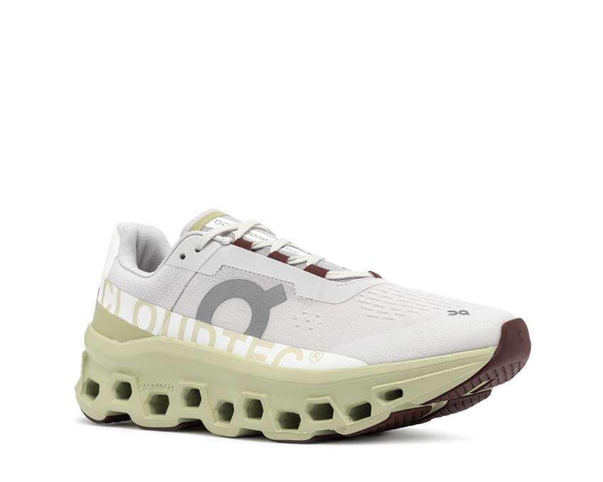 On Cloudmonster Frost Acacia vista lateral — amortiguación CloudTec