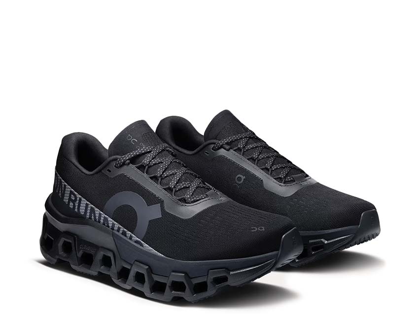 On Cloudmonster 2 Black side view — maximum black cushioning profile