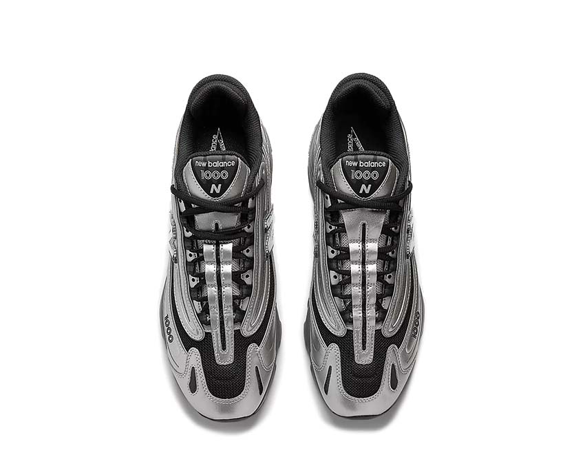 New Balance 1000 Metallic Silver dettaglio — materiale argentato e mesh tecnico