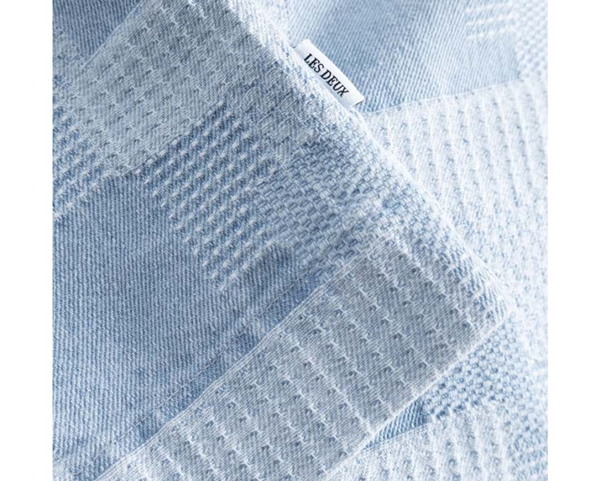 Les Deux Layton Denim Jacquard Overshirt detail — jacquard pattern pockets