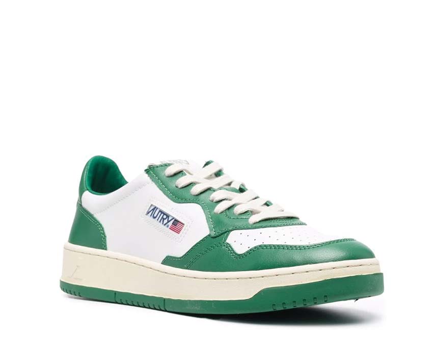 Autry Medalist Low White/Green vista lateral — mix cuero lona verde blanco