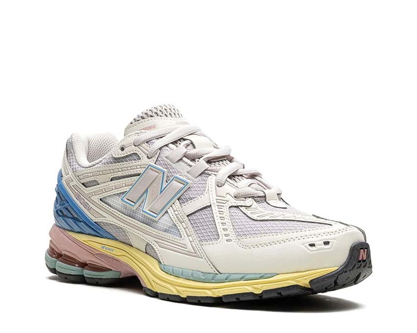 New Balance 1906 Utility Angora vista lateral — detalles Blue Laguna Orb Pink