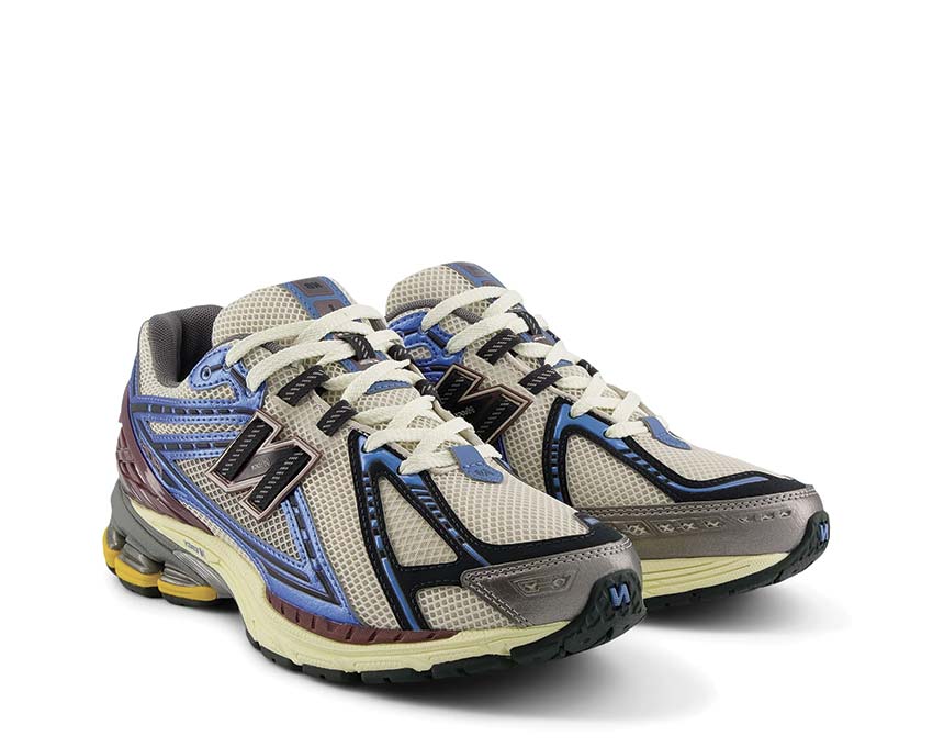 New Balance 1906R New Spruce vista lateral — parte superior de malla y ante superpuestos