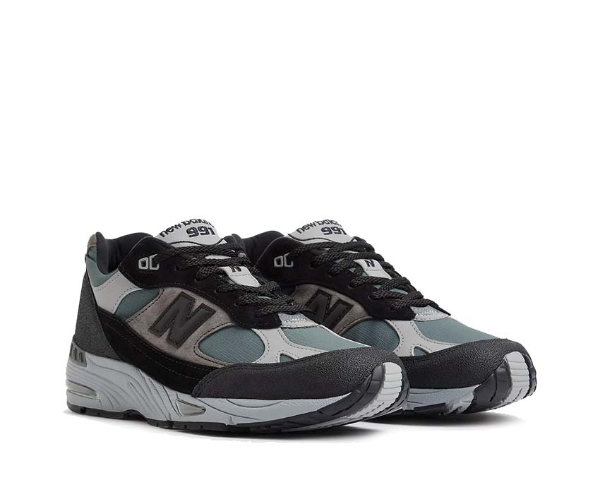 vue latérale — New Balance 991 V1 noir turbulence tige suède mesh winter