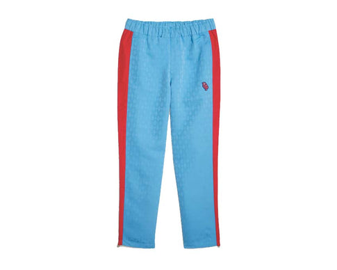 Puma x Dapper Dan Women's Track Pants Regal Blue — pantalon de survêtement femme collaboration luxe bleu