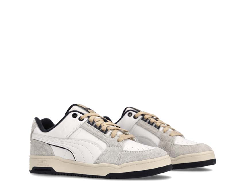 Puma Slipstream Lo Service Line White Navy side view — two-tone smooth leather