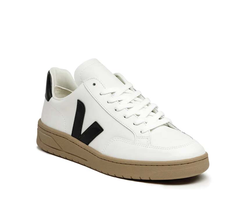 Veja V-12 Extra White/Black side view — smooth three-tone leather