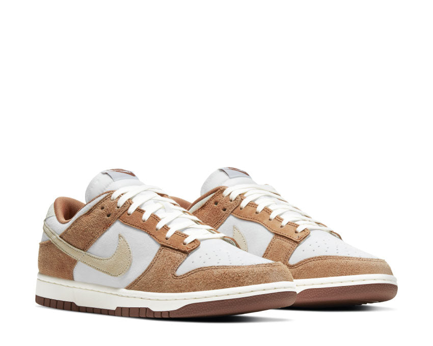 Nike Dunk Low Retro Premium Curry Sail side view — fossil premium leather