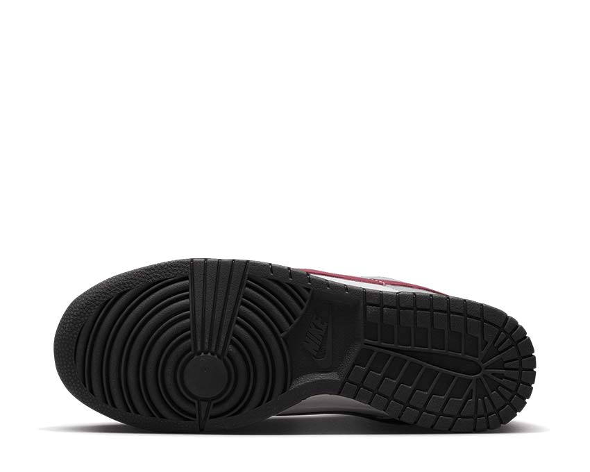 Nike Dunk Low Black White — vista frontal unisex colorway esencial